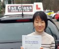 Vivian with Driving test pass certificate